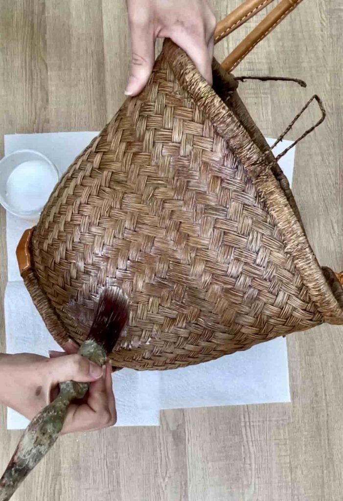 image shows sealing stained basket with clear coat.